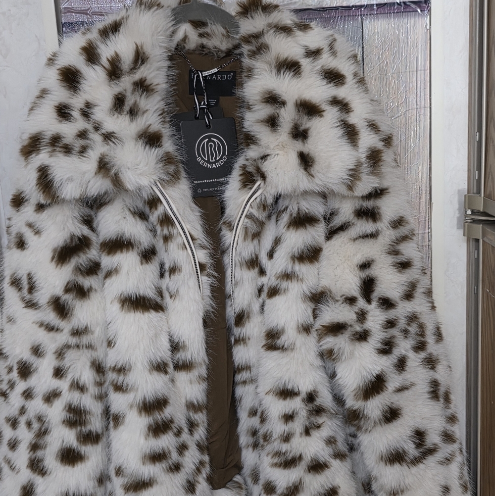 SPOTTED LYNX Fur:  Thick, plush, warm, soft and cuddly faux spotted fur coat.